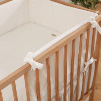 Linen store crib bumper