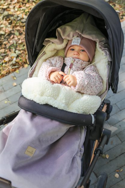 Baby girl outlet stroller with footmuff