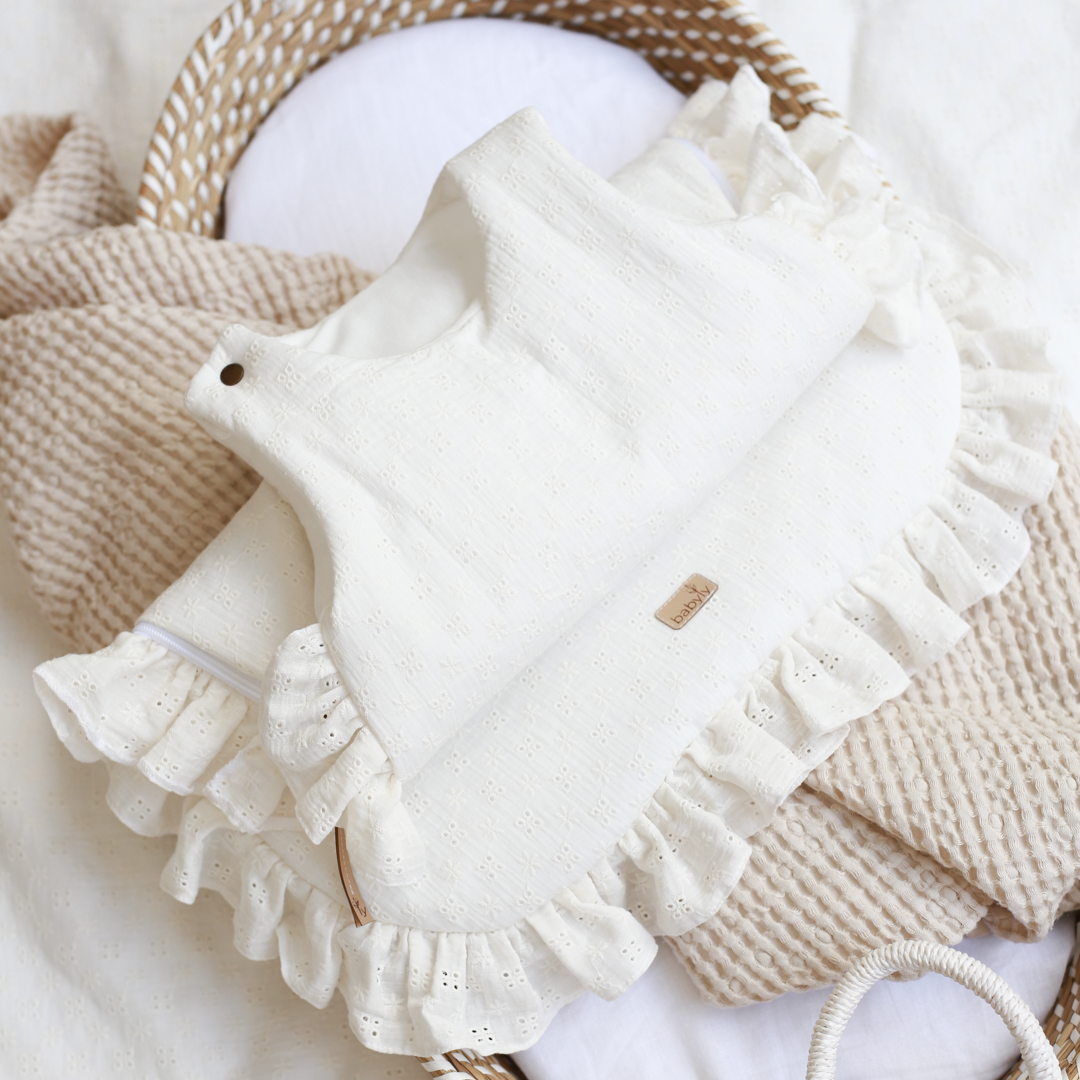 Embroidered baby sleeping bag with frills ecru